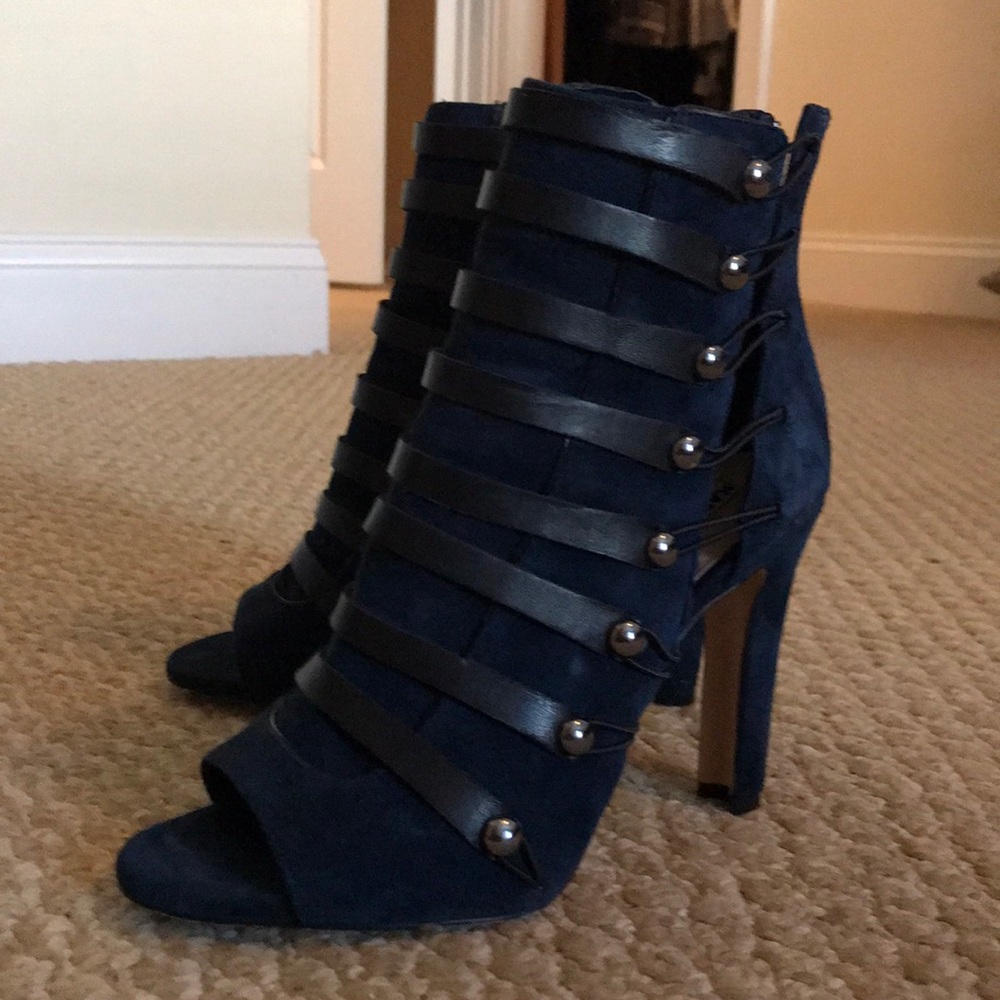 Karol langerer navy lace up open toe stiletto.
